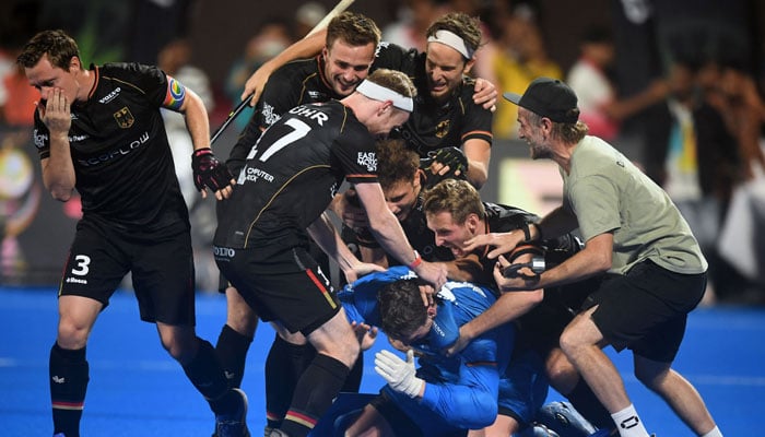 German players celebrate after saving the final penalty stroke - Photo: AFP