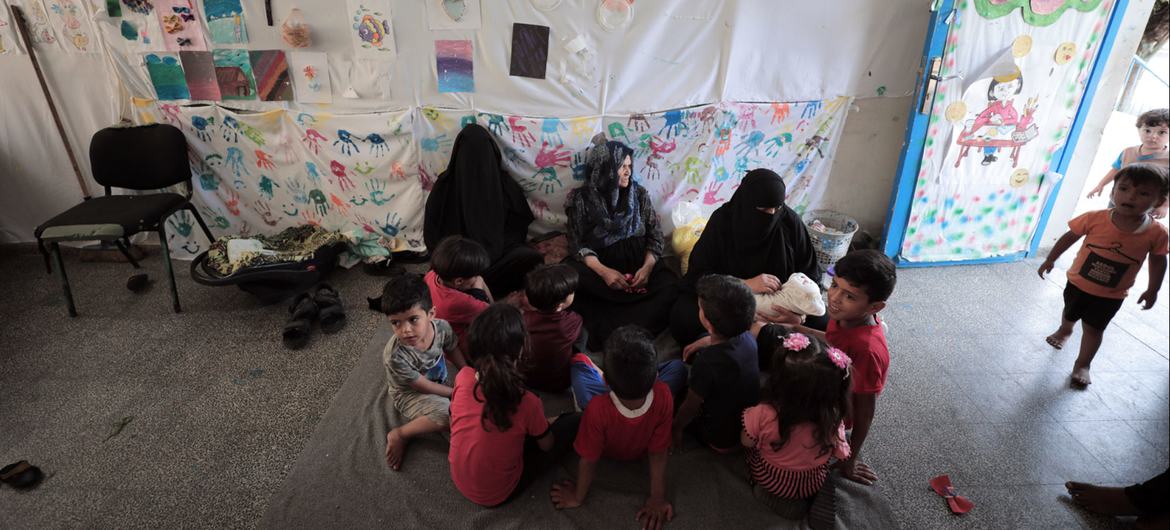In response to a renewed escalation of violence, a Palestine refugee family find refuge at the UNRWA Beit Lahiya Preparatory Girls’ School in northern Gaza. In response to a renewed escalation of violence, a Palestine refugee family find refuge at the UNRWA Beit Lahiya Preparatory Girls’ School in northern Gaza.