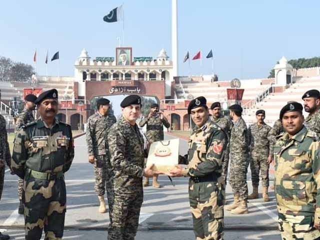 Exchange of sweets and gifts at Wagah border on the occasion of Indian Republic Day Photo: Express News