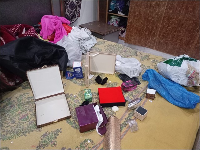 A photo of the scattered belongings after the burglary in the house (Photo: Express)