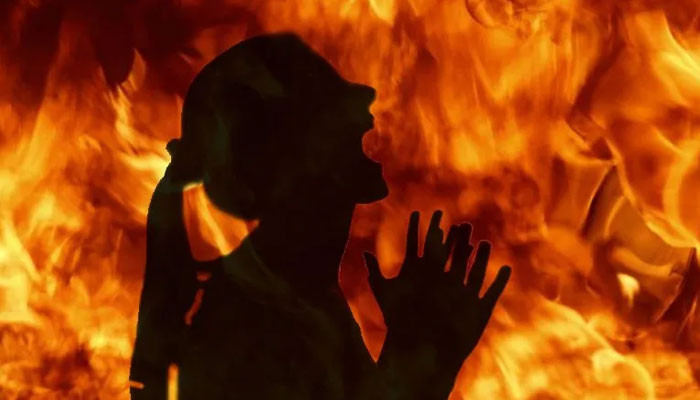 India, Firefighter burns his own wife to death