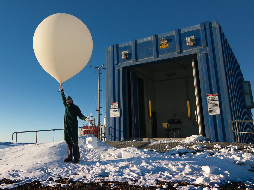 A weather balloon is prepared for release at an Australian Antarctic station. A weather balloon is prepared for release at an Australian Antarctic station.