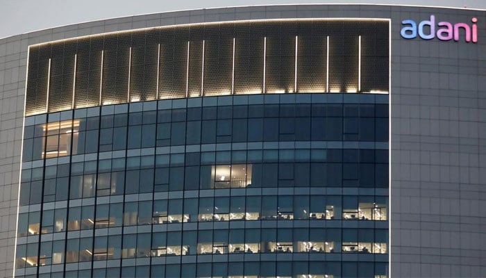Adani Group halts sale of shares, 0 billion loss Adani Group office, file photo