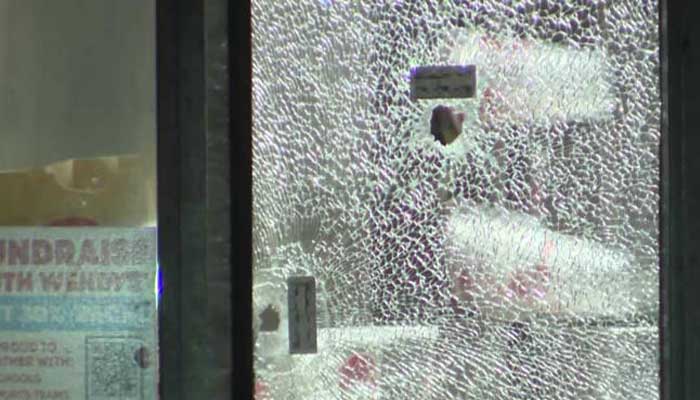 The mark of the bullet fired by the user can be clearly seen on the window.