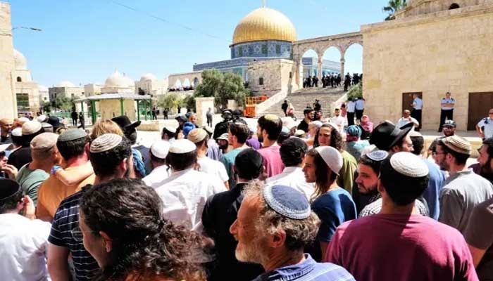 Jewish citizens gather to pray outside the Al-Aqsa Mosque, file photo.