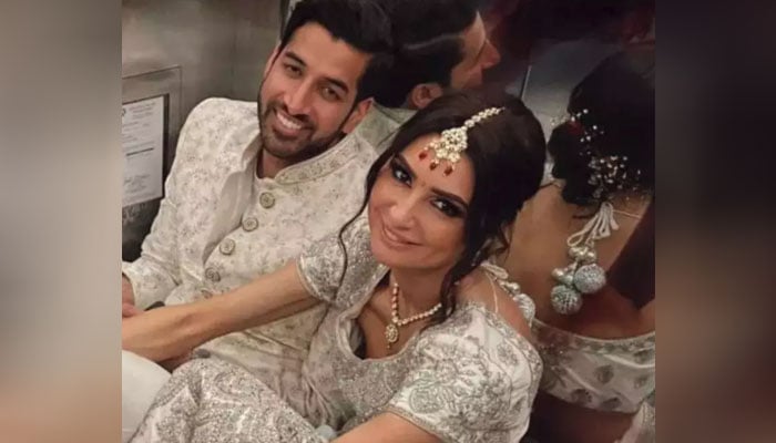 The bride and groom got stuck in the elevator on the day of the reception