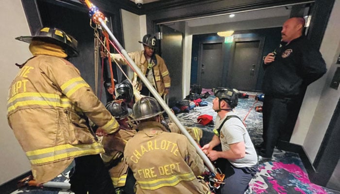 The bride and groom got stuck in the elevator on the day of the reception