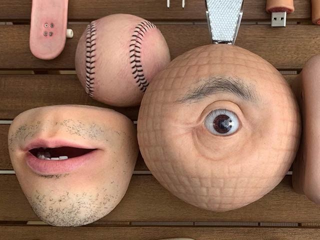 Japanese artist Masataka Shishido creates USB sticks, stamps, wallets and purses shaped like human skin and organs.  Photo: Courtesy of Reuters 