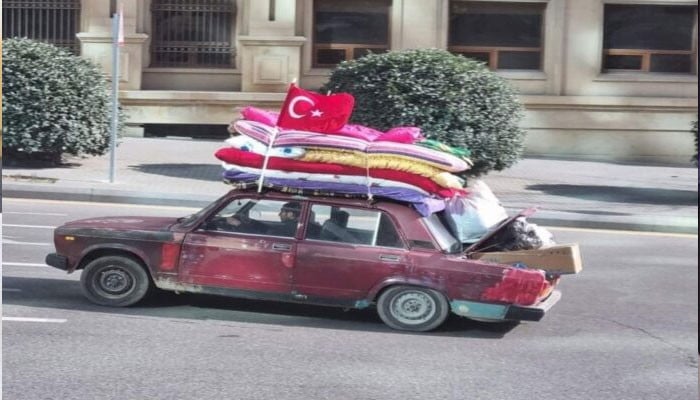 An Azerbaijani man arrived in his Faticher vehicle with relief supplies