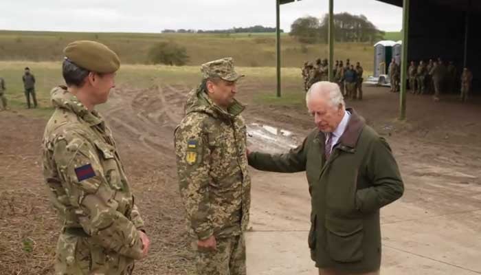 King Charles meets with Ukrainian personnel undergoing military training in the UK