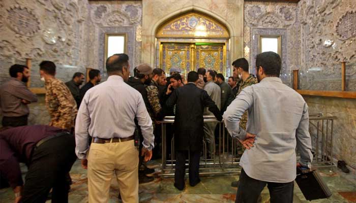 October 2022: Security personnel gather at the shrine premises after the explosion.