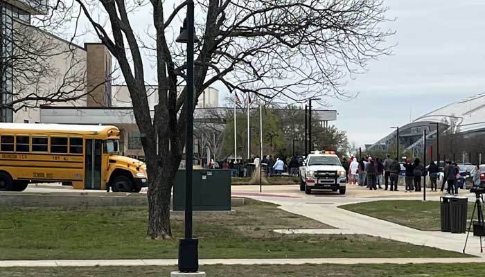 Parents are outside the school to pick up their children after the shooting.