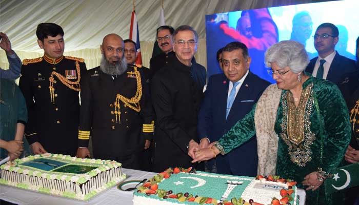 Flag hoisting ceremony on Pakistan Day at London High Commission Pakistani High Commissioner and other officials are cutting the cake on the occasion of Pakistan Day.