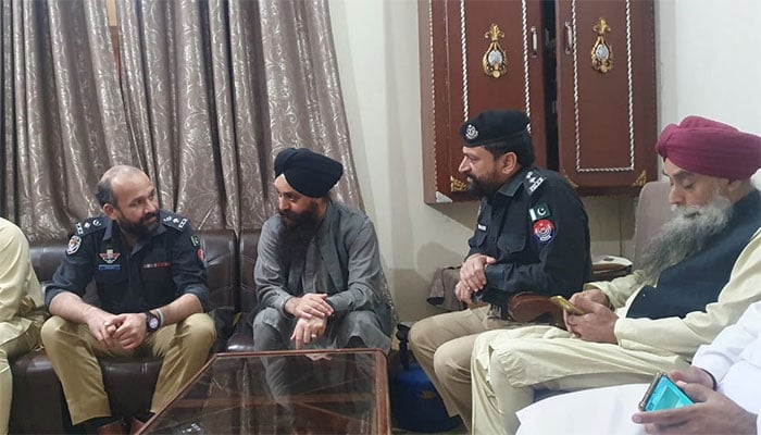 A Sikh was killed in firing in Peshawar's Deer Colony SSP Operations met the relatives of the Sikh businessman at his residence. Photo Geo News