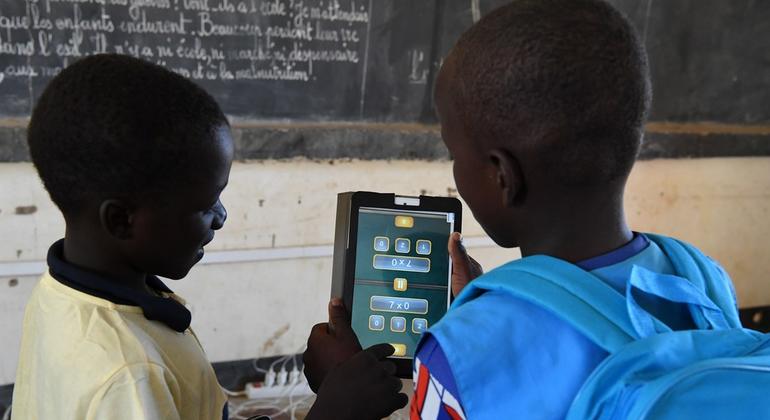 Children attending class with their tablets in Radi school, in the village of Safi, in the South of Niger.