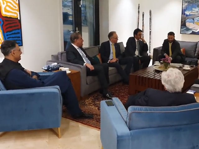 Tehreek-e-Insaaf leaders meeting with foreign ambassadors, discussing the election