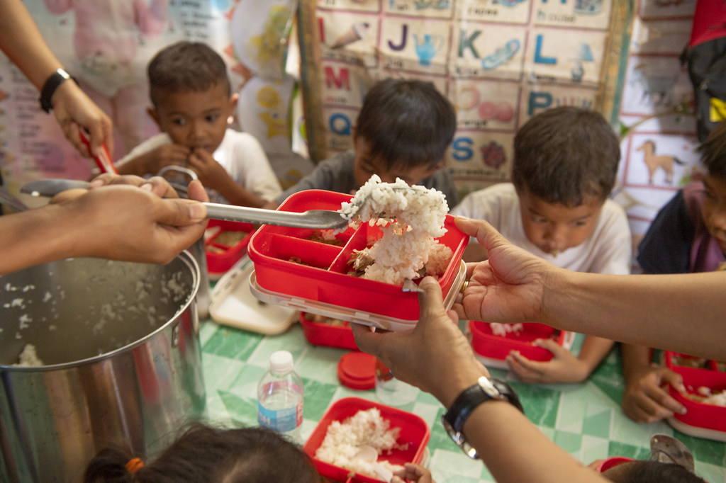 A WFP-supported school meal is served to children in the Philippines. A WFP-supported school meal is served to children in the Philippines.