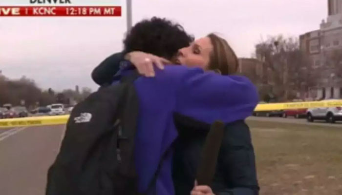 A female reporter meets her child while covering a school shooting