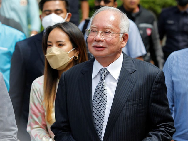 Ex-Malaysian Prime Minister acquitted of corruption charges, 12 years in prison in second case