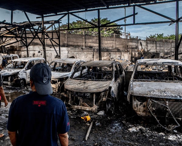 Fire at Indonesian oil depot engulfs town, kills 18