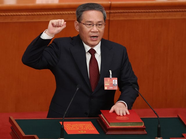 The newly elected Prime Minister took oath;  He is a close associate of President Xi Jinping