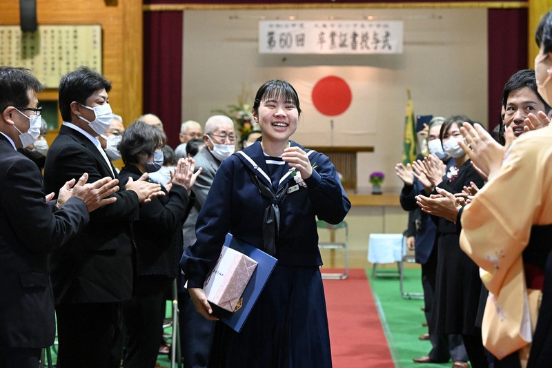 The only female student of a school built on a Japanese island has completed her graduation