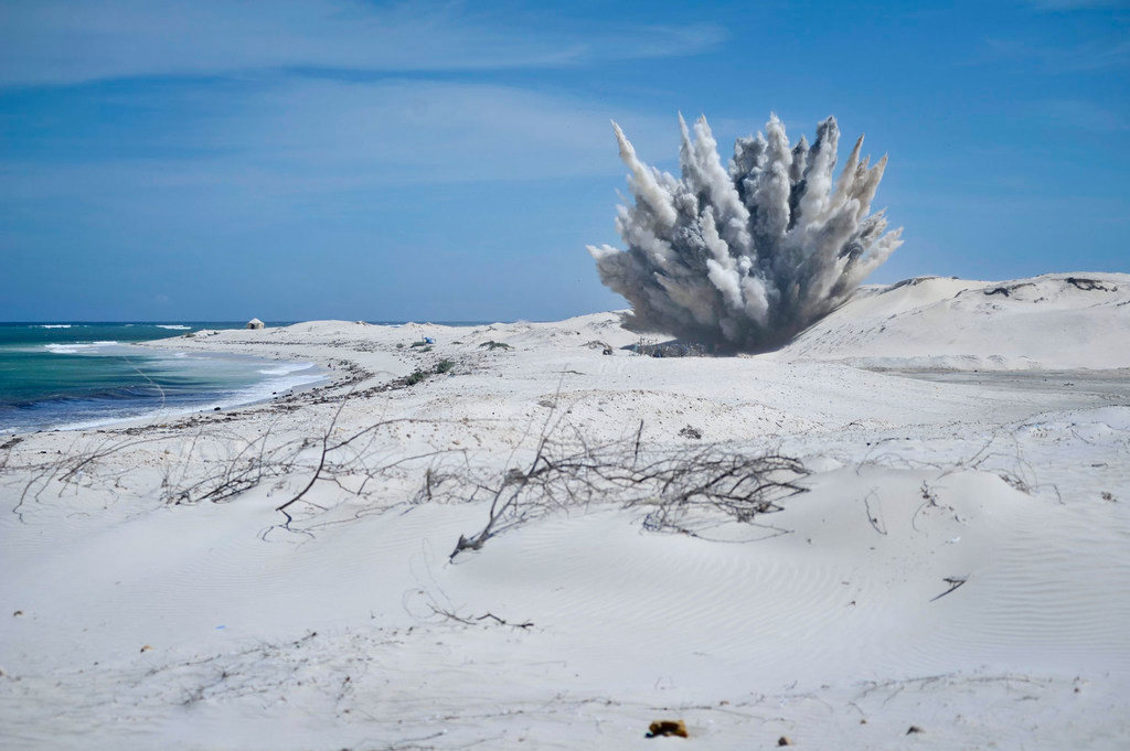 A joint African Union Mission in Somalia (AMISOM) team detonates a weapon at a safe location outside Mogadishu. (May 2013) A joint African Union Mission in Somalia (AMISOM) team detonates a weapon at a safe location outside Mogadishu. (May 2013)