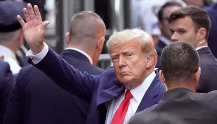 Who are the charges against Trump? File photo