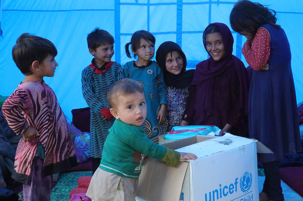 Displaced children livingi in Khoshi District in Afghanistan receive hygeine kits. Displaced children livingi in Khoshi District in Afghanistan receive hygeine kits.