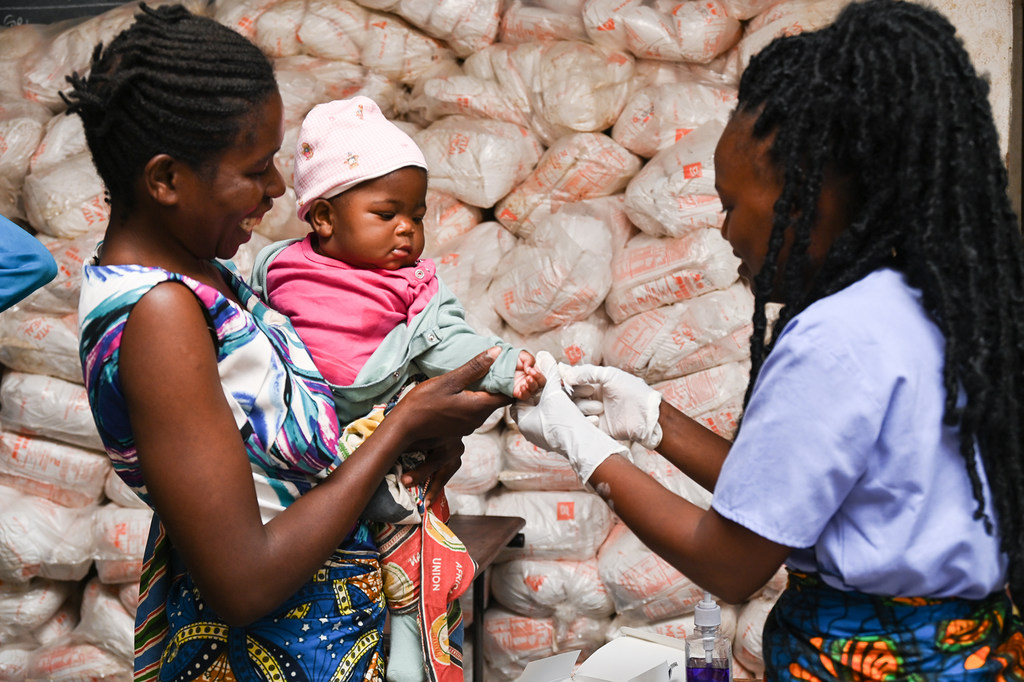 A six-month-old baby is tested for malaria after Cyclone Freddy caused floods and devastation in Malawi. A six-month-old baby is tested for malaria after Cyclone Freddy caused floods and devastation in Malawi.