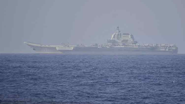 China began to surround Taiwan with its warships