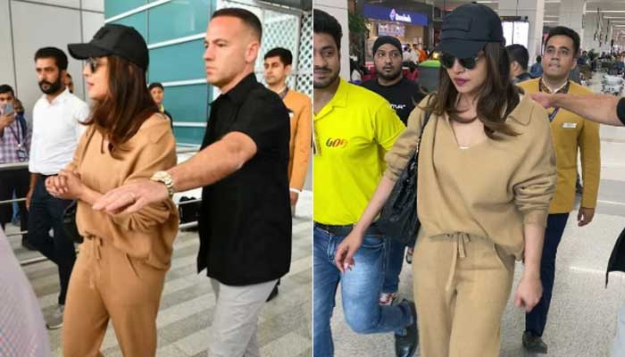 Fans break the security fence and get close to Priyanka for selfies