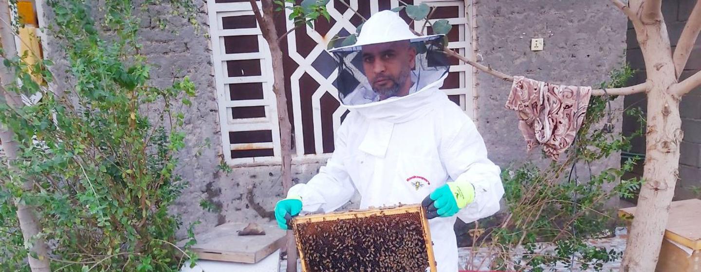 Ziad Sa’ad, a beekeeper from Basra, Iraq, is raising awareness among his community on the importance of safety at work. Ziad Sa’ad, a beekeeper from Basra, Iraq, is raising awareness among his community on the importance of safety at work.