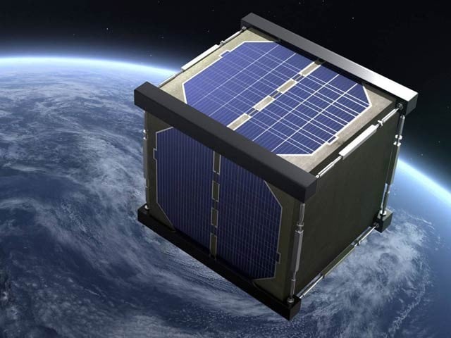 Pavement of satellites enclosed in a wooden box