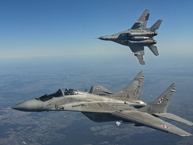 Ukraine War;  Russian and Polish military planes face to face