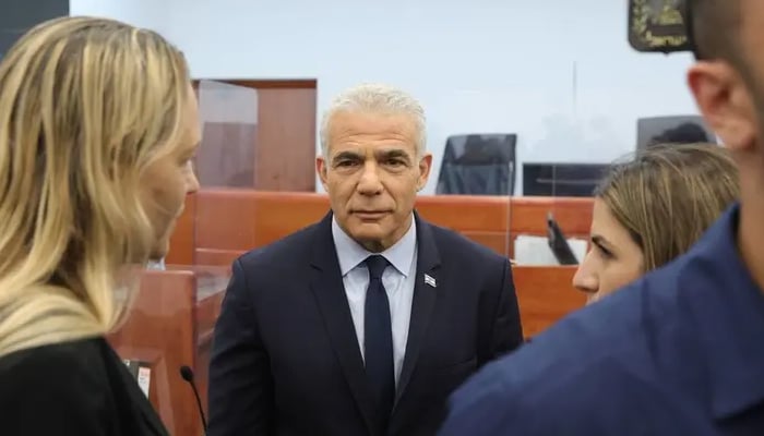 Corruption cases, opposition leader testified against Israeli Prime Minister Netanyahu Israeli opposition leader arriving in court, photo courtesy of Arab Media