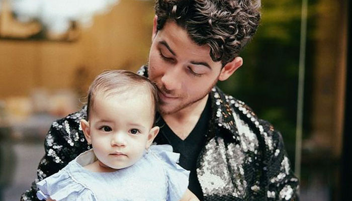 Beautiful photo of Nick Jonas with his daughter