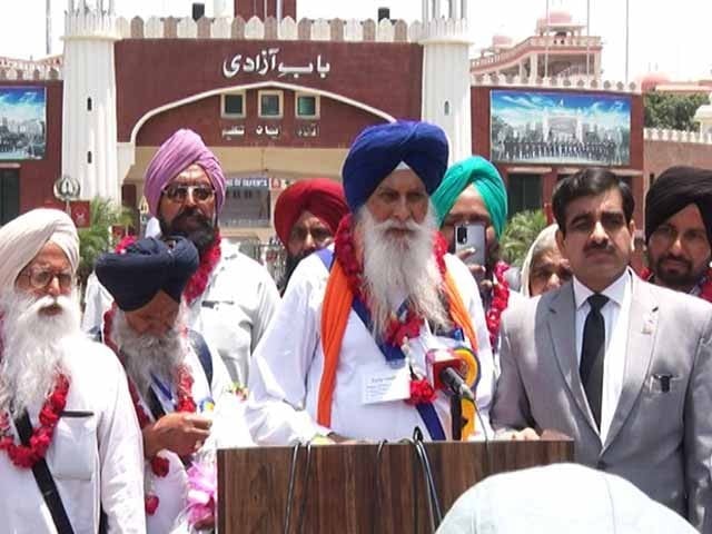 Indian pilgrims reached Pakistan to celebrate the death anniversary of Guru Arjun Devji Photo: Express News