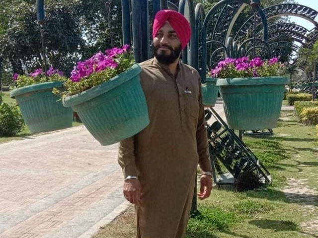 Sikh businessman killed by unknown accused in Peshawar Memorial photo of slain Manmohan Singh