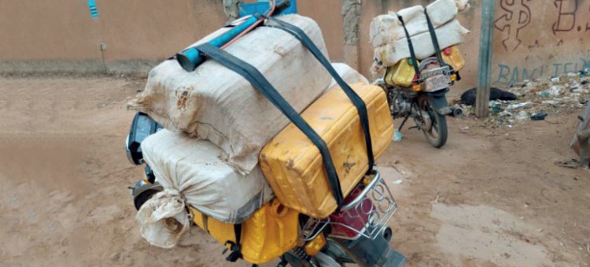 Motorbikes transporting smuggled fuel in Dosso, Niger, close to the Nigerian border. Motorbikes transporting smuggled fuel in Dosso, Niger, close to the Nigerian border.