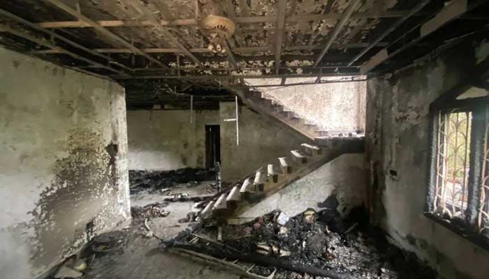 An angry mob in India burnt down the house of a state minister