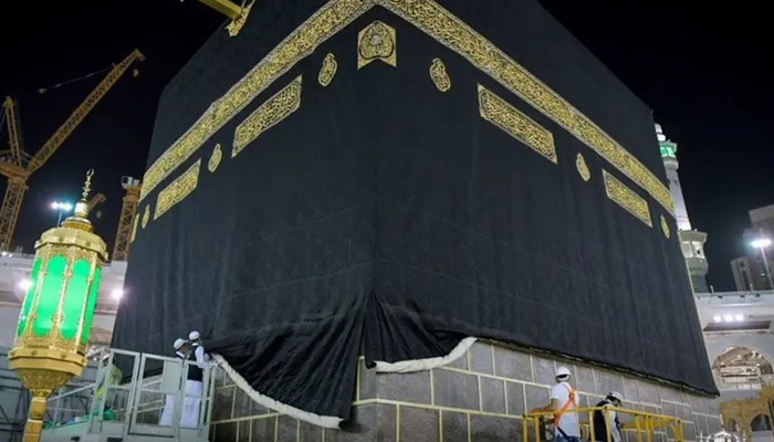 In preparation for the Hajj, the cover of the Kaaba was raised