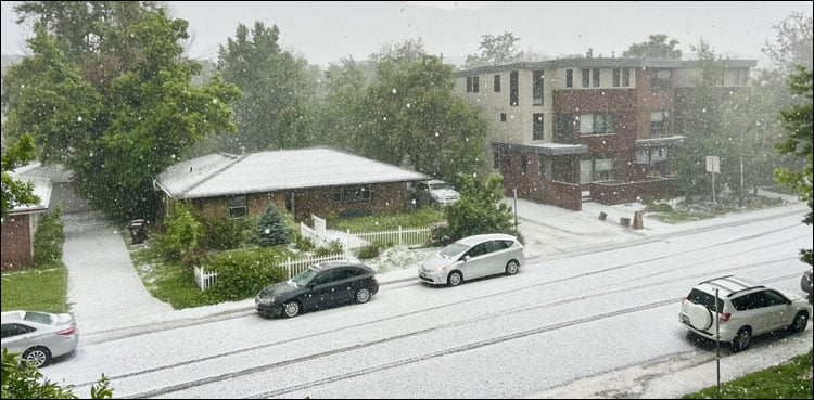 In the American state of Colorado, people are confined to their homes as rain falls like peas