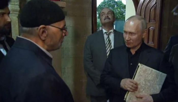 Russian President Vladimir Putin hugged the Holy Quran Screen Grab. Social Media