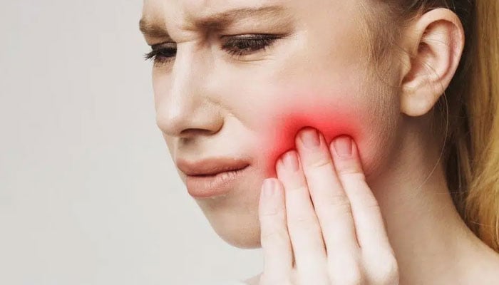 Tooth decay and gum infection can shrink the brain, research suggests File photo