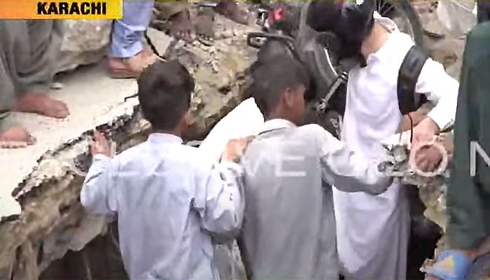 The motorcycle rider fell into the Korangi drain The motorcycle rider fell into the Korangi drain