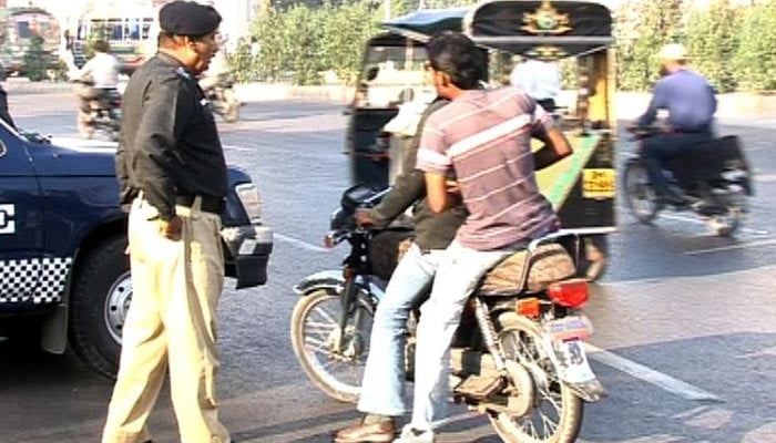 Double riding of motorcycles banned on 9th and 10th of Muharram in Karachi File photo