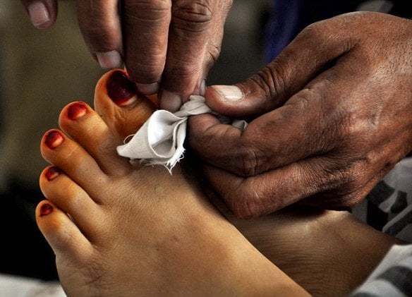 A decomposed body was recovered from the house of a police officer's wife