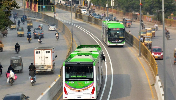 The speeding car hit the green line bus and overturned