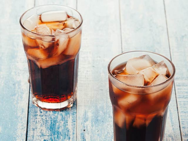 The sweetness of dark soft drinks may be the cause, says the World Health Organization